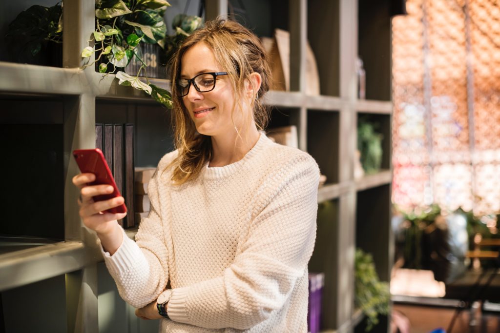 Woman looking at an online dating profile