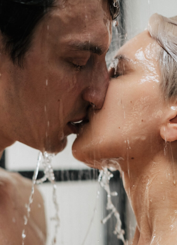 Couple kissing in the shower