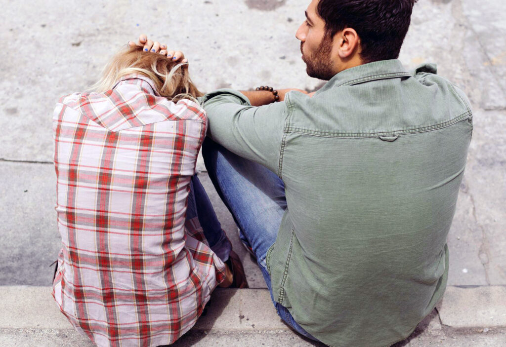 Man and woman trying to resolve a conflict in their relationship