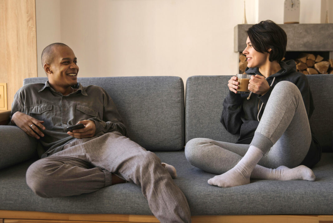 Couple on sofa, working on relationship repair