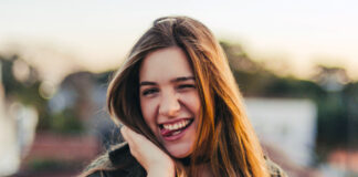 5 Essential Ways To Celebrate Self Pleasure Girl being cheeky about self pleasure