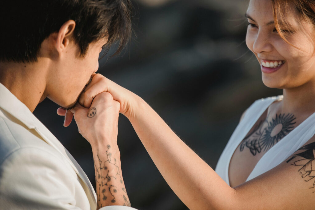 Kissing a hand is a great non-verbal way to give a woman a compliment.