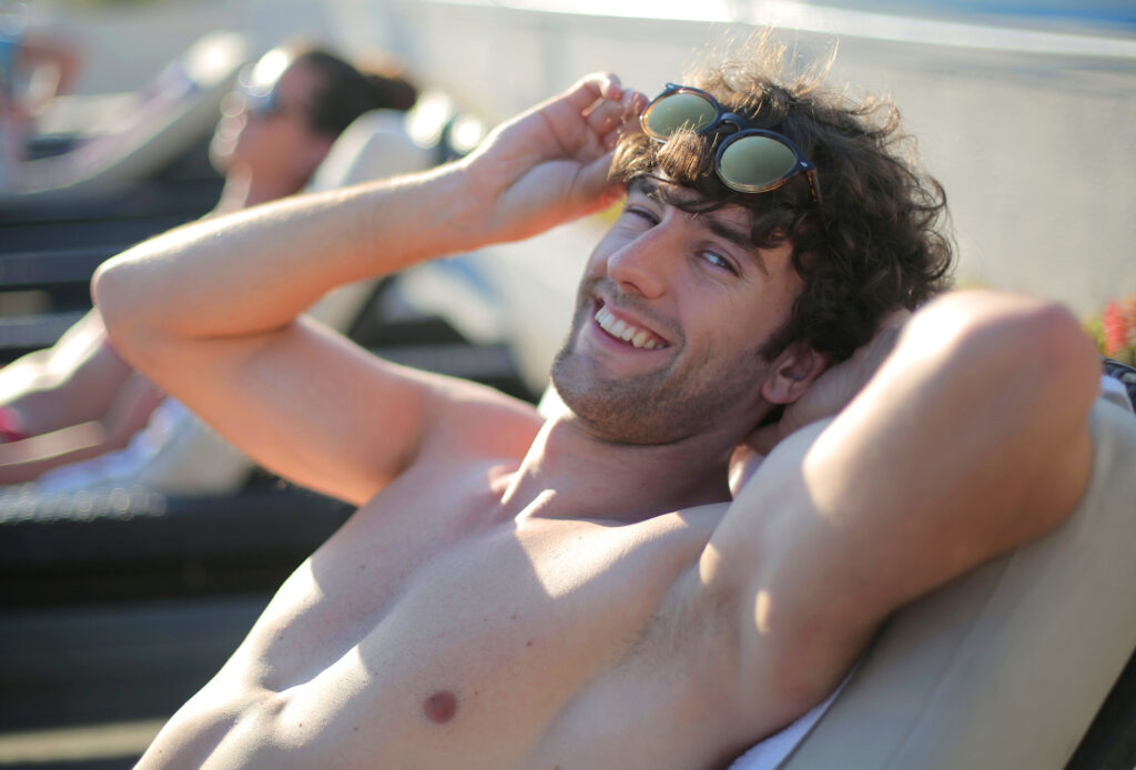Smiling, flirting young man