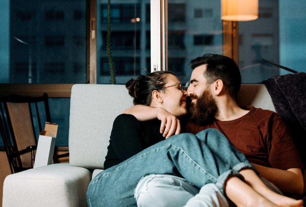 Happy couple on sofa